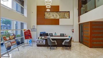Welcome to our reception area, featuring a reception desk, comfortable seating, and a beautiful view.