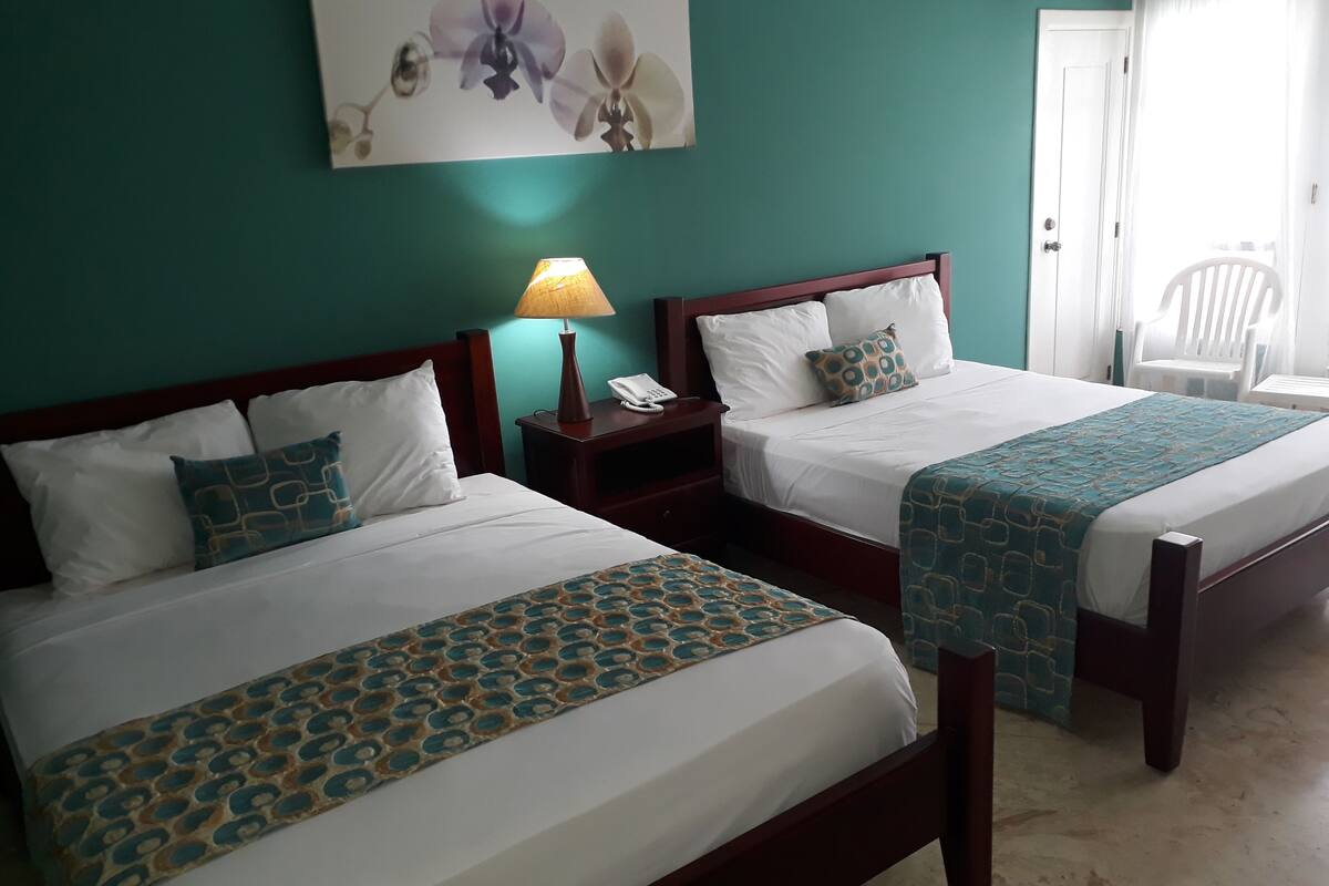 Deluxe Room, 1 Double Bed, Pool View | Minibar, in-room safe, desk, blackout curtains