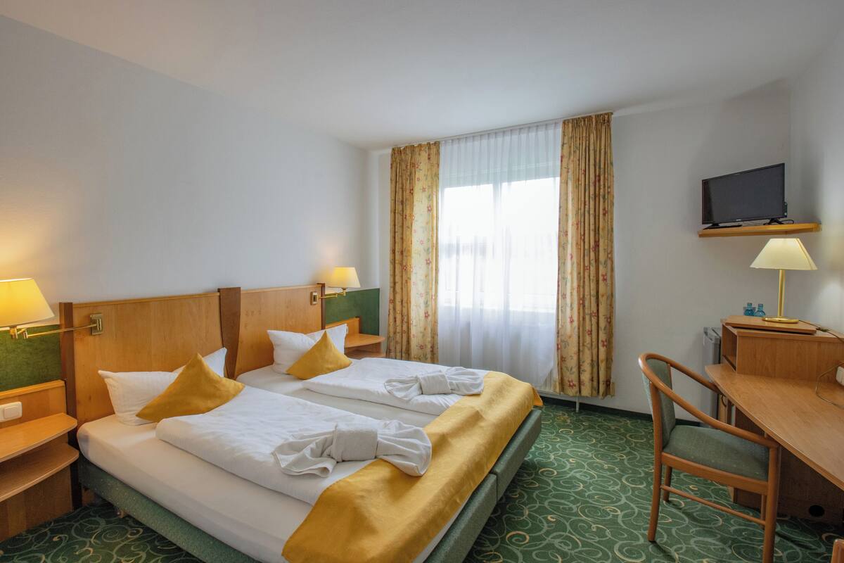 Standard-Doppelzimmer | Schreibtisch, kostenloses WLAN, individuell dekoriert, Bettwäsche