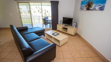 The Penthouse | Living area | Flat-screen TV