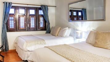 Premium bedding, down duvets, individually decorated