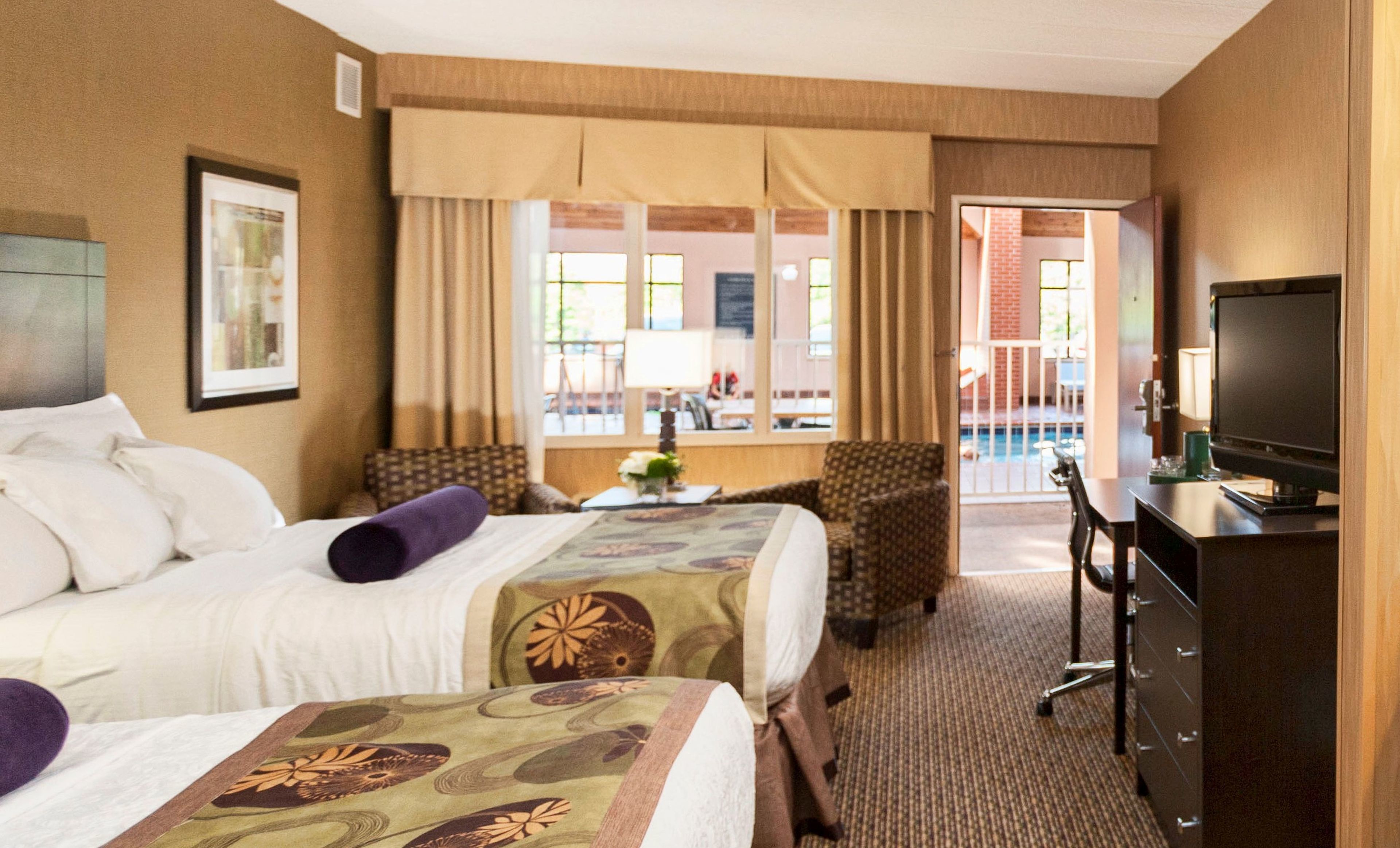 standard room, 2 queen beds, pool view | pillow-top beds, desk, blackout curtains, iron/ironing board