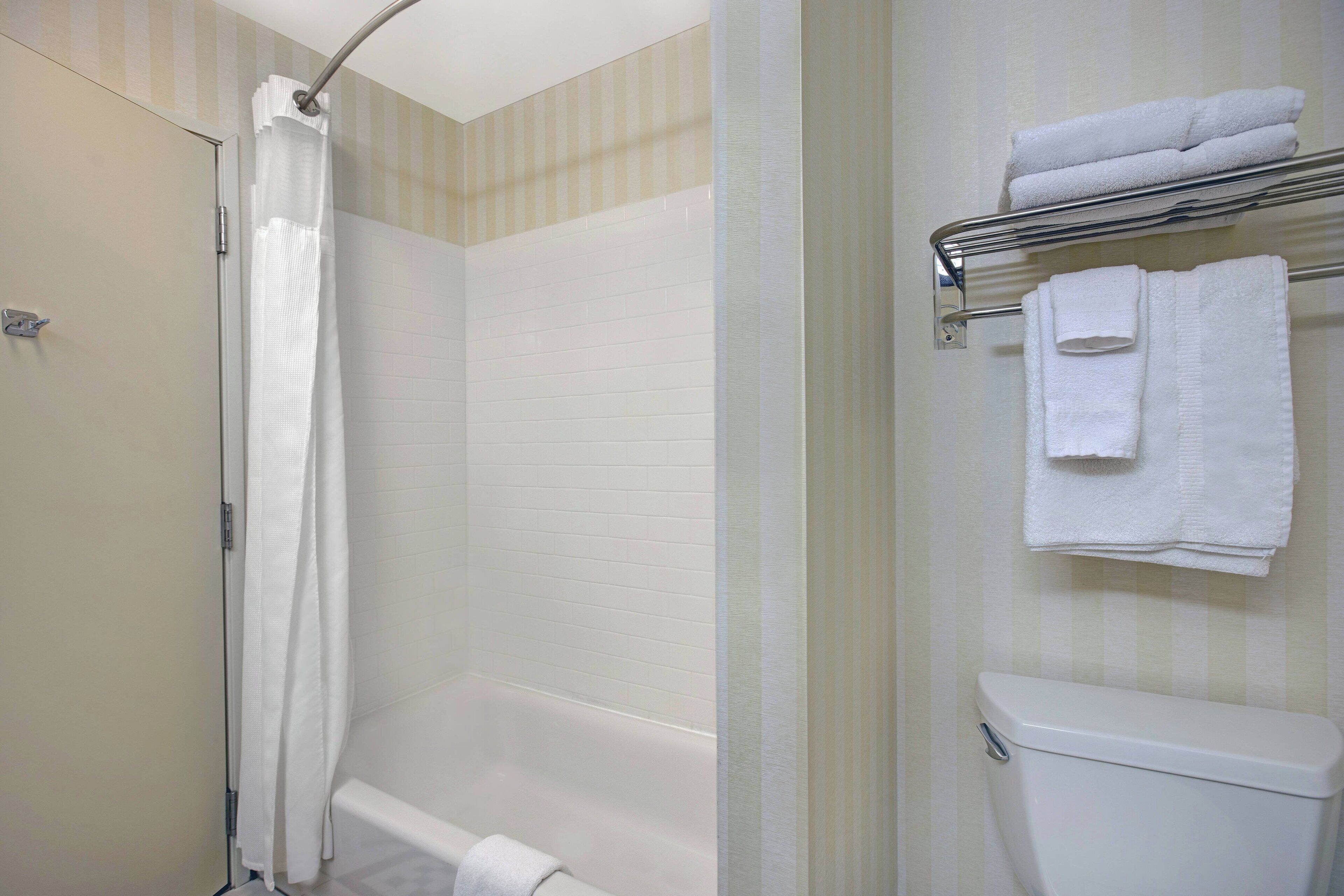 combined shower/bathtub, free toiletries, hair dryer, towels