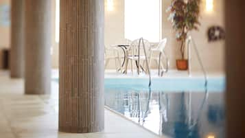 Indoor pool, open 6:00 AM to 11:00 PM, pool loungers