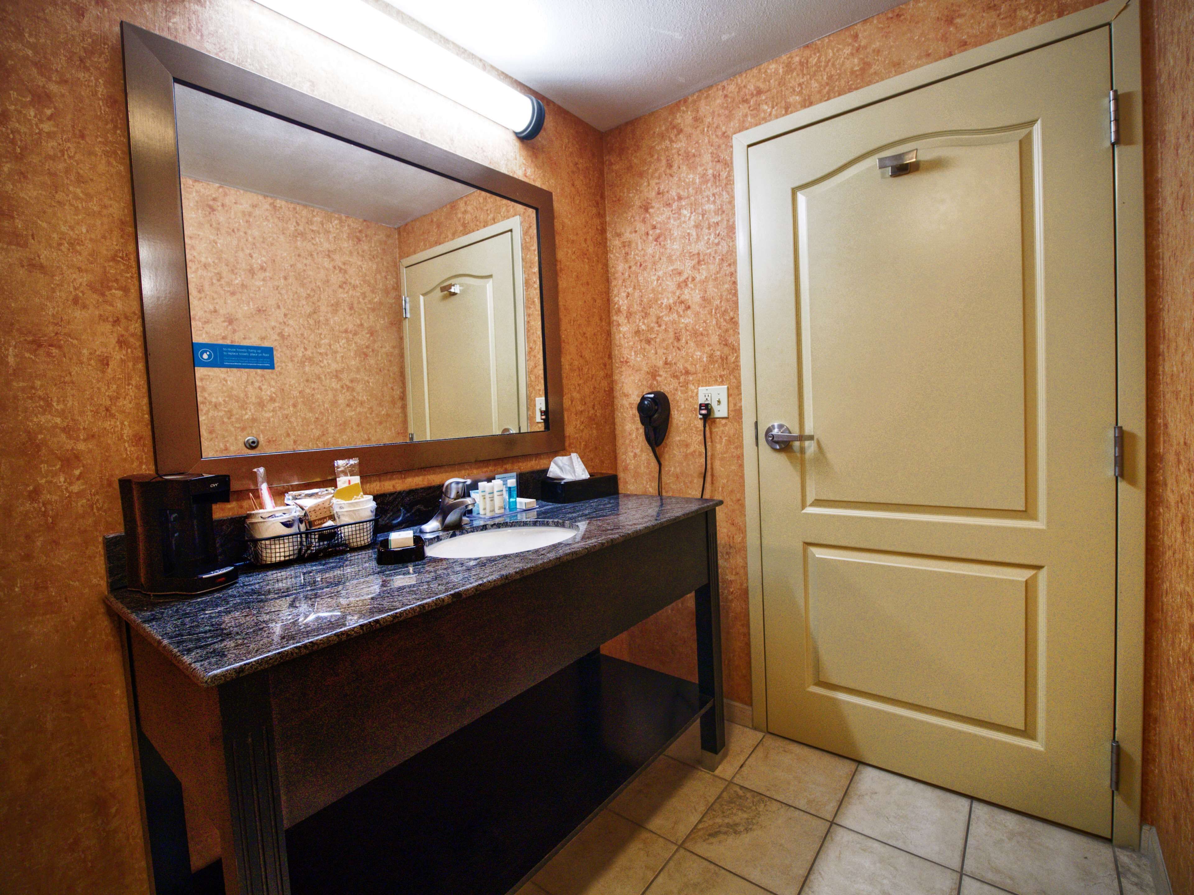 hair dryer, towels, soap, shampoo