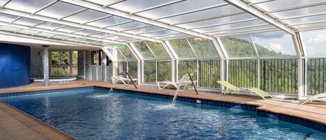 Indoor pool, open 11:00 AM to 8:00 PM, pool loungers
