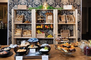 A buffet with various food items and spreads. - OREA Hotel Arigone Olomouc (Olomouc)