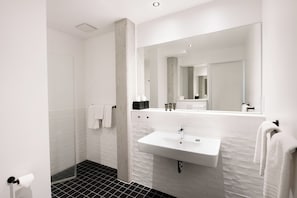 Apartment, 1 Bedroom | Bathroom | Shower, hair dryer, towels, soap