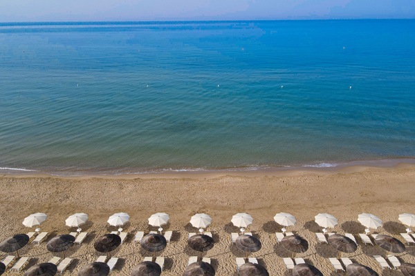 Sun loungers, beach umbrellas, beach towels