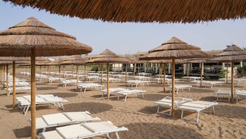 Lettini da mare, ombrelloni, teli da spiaggia