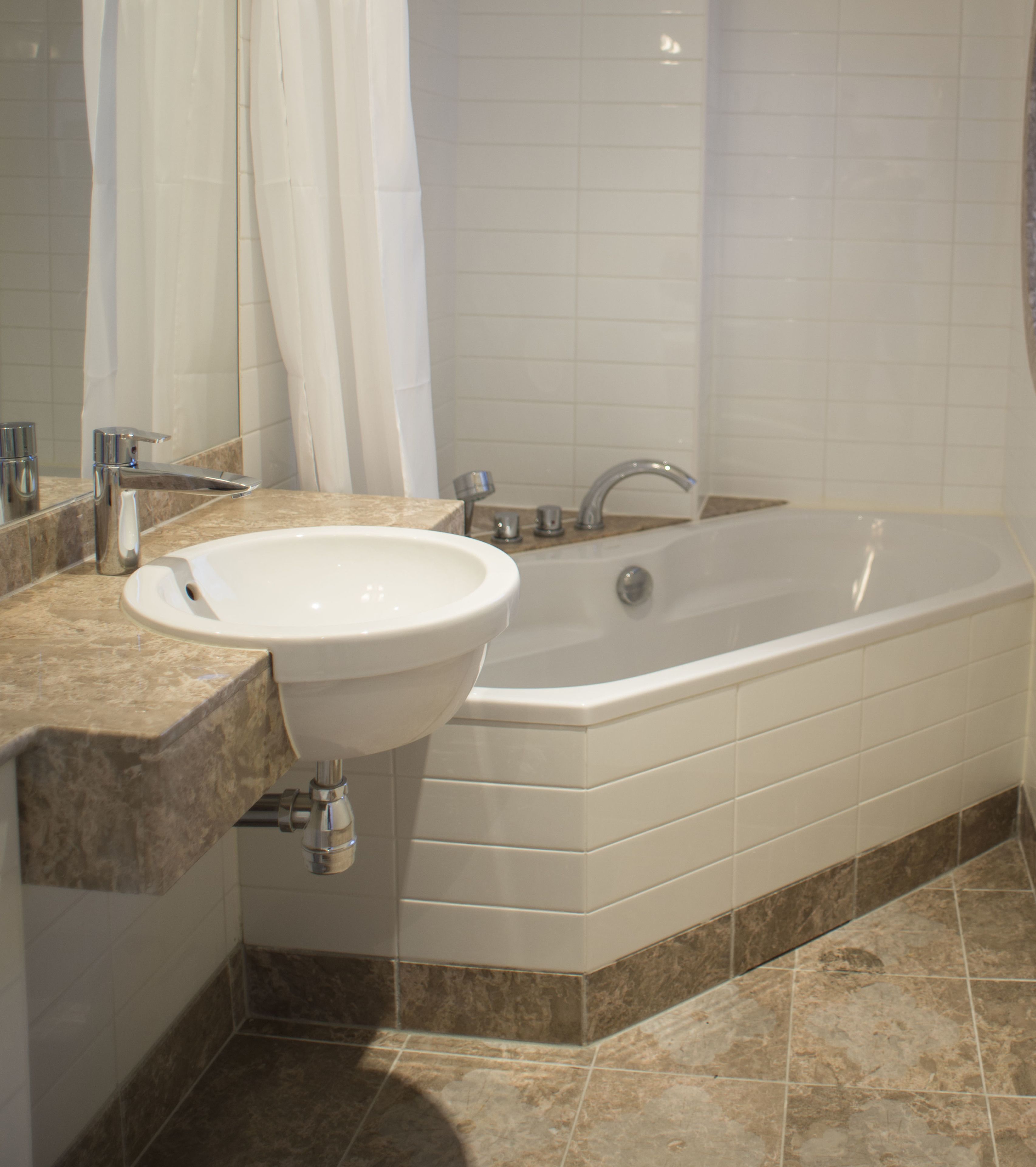 free toiletries, hair dryer, heated floors, towels