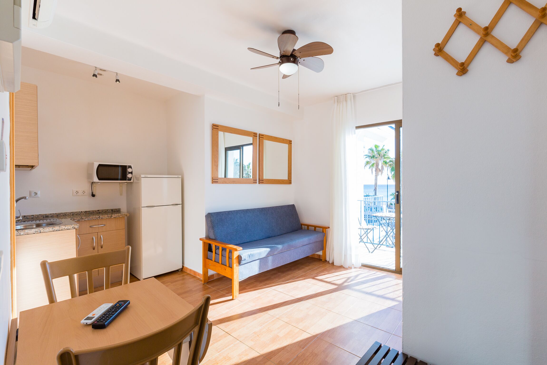 Superior Double Room, Balcony | Living room | Flat-screen TV