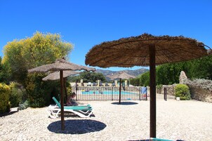 Outdoor pool, open 8:00 AM to 10:00 PM, pool umbrellas, sun loungers