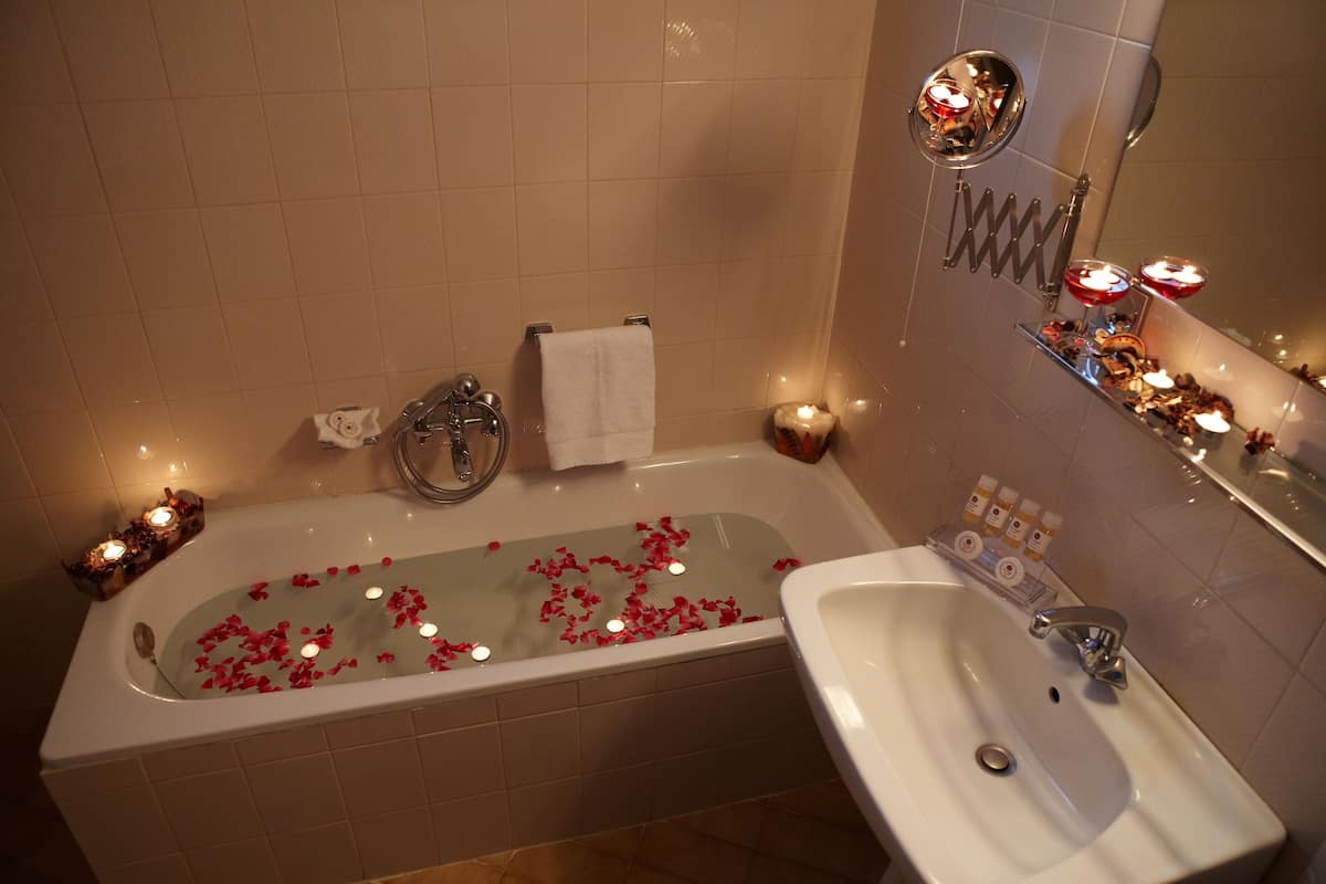 suite | bathroom | hair dryer, bathrobes, slippers, towels