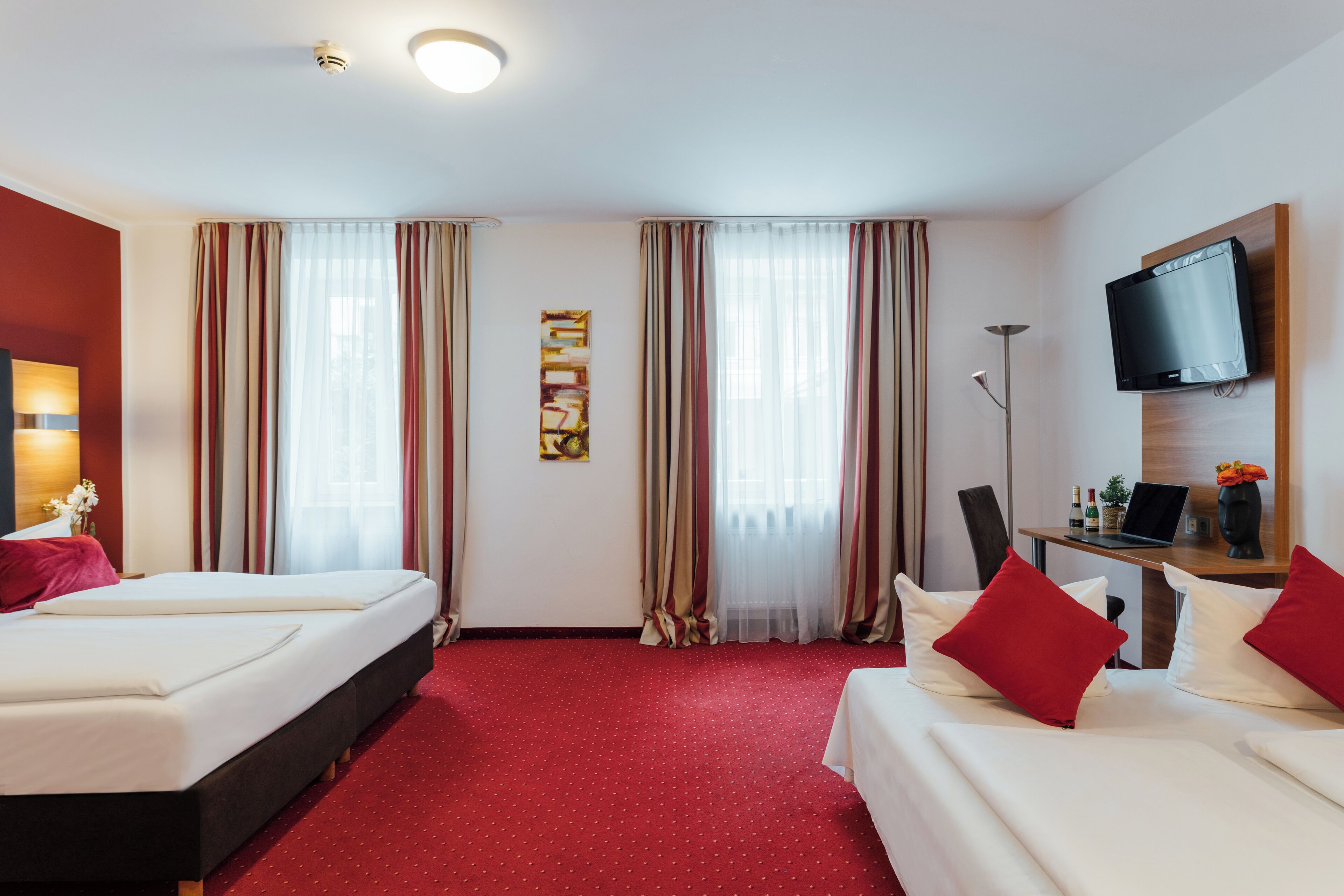 family room | premium bedding, in-room safe, individually decorated