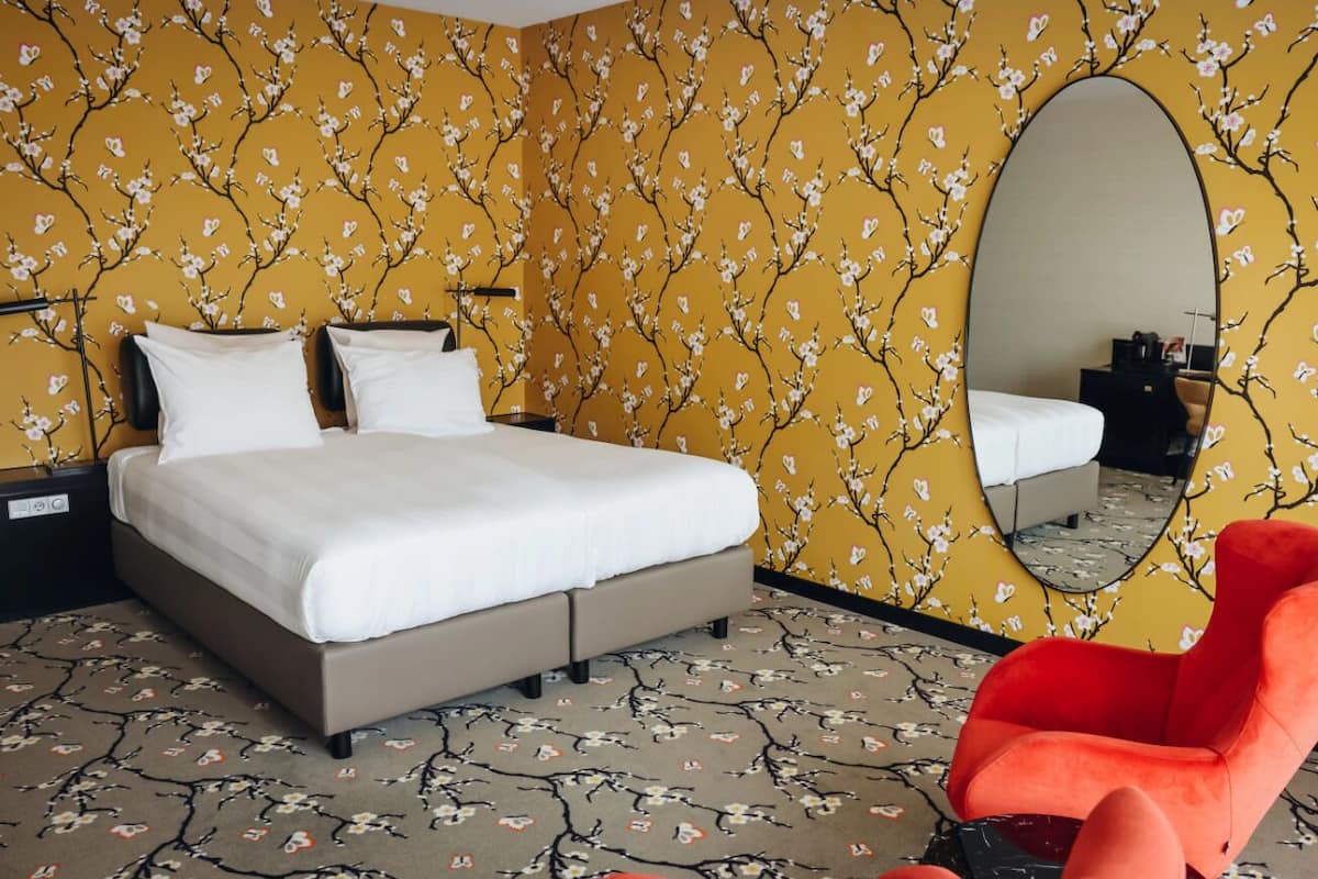 deluxe double room, 2 single beds, balcony | in-room safe, desk, blackout curtains, soundproofing