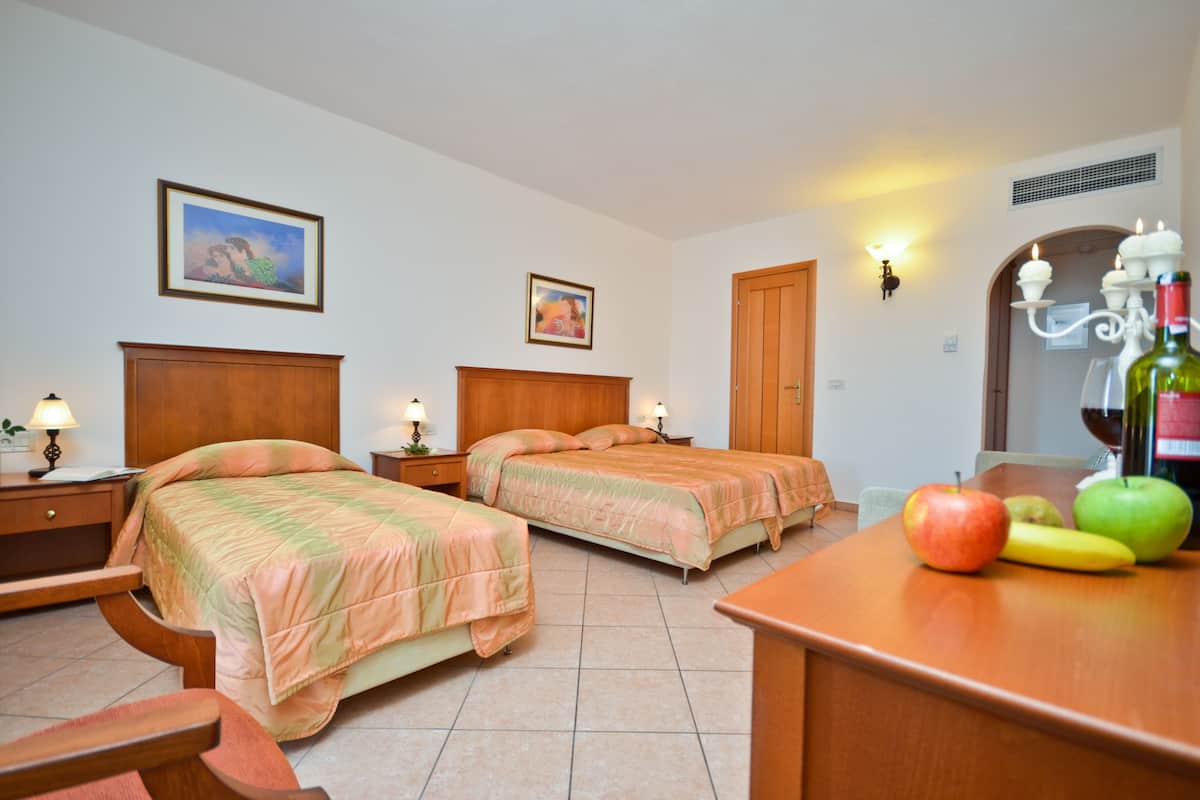 Premium bedding, pillowtop beds, in-room safe, individually furnished
