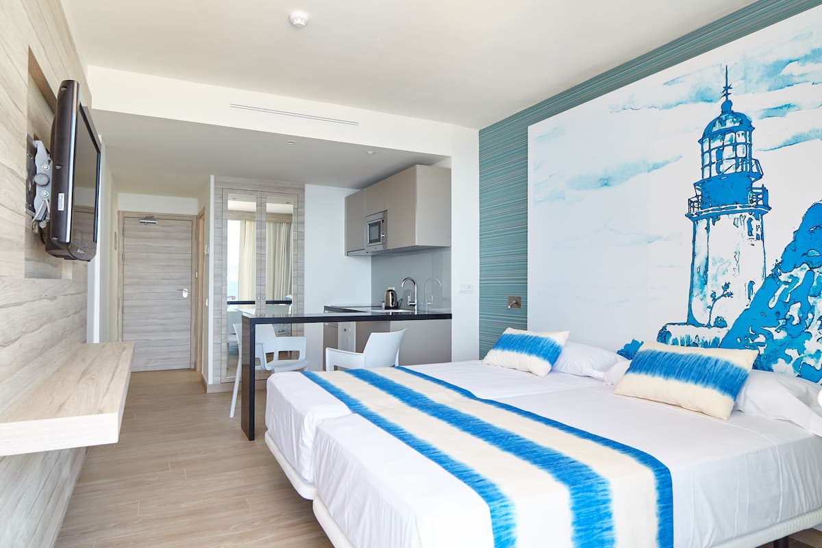 In-room safe, laptop workspace, blackout drapes, soundproofing