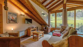 อพาร์ทเมนท์สำหรับครอบครัว, หลายห้องนอน, 2 ห้องน้ำ (Vallorcine Loriaz 44) | ห้องนั่งเล่น | ทีวีจอแบน, ช่องภาพยนตร์ใหม่, พื้นอุ่น