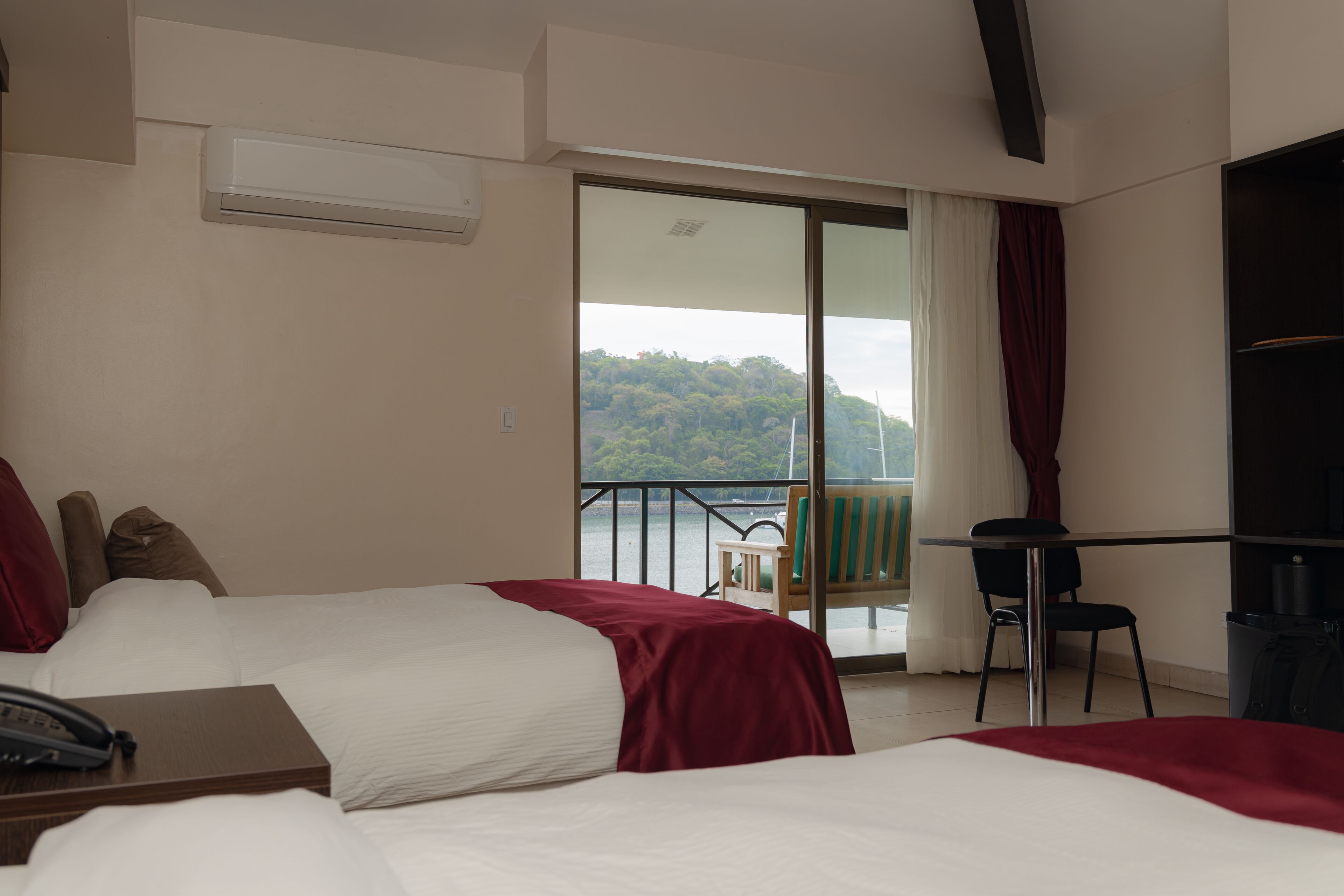 standard room, 2 double beds, bay view | down duvets, in-room safe, desk, free wifi