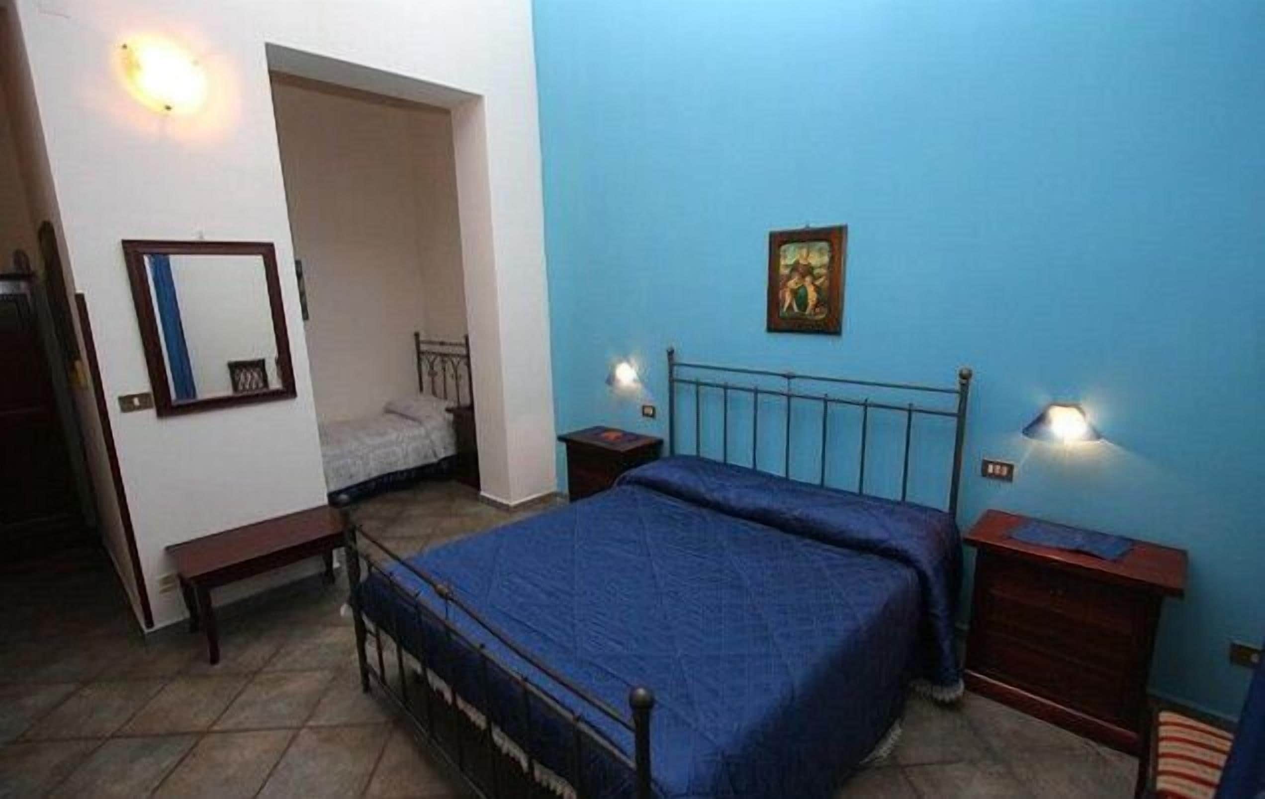 quadruple room | premium bedding, minibar, in-room safe, desk