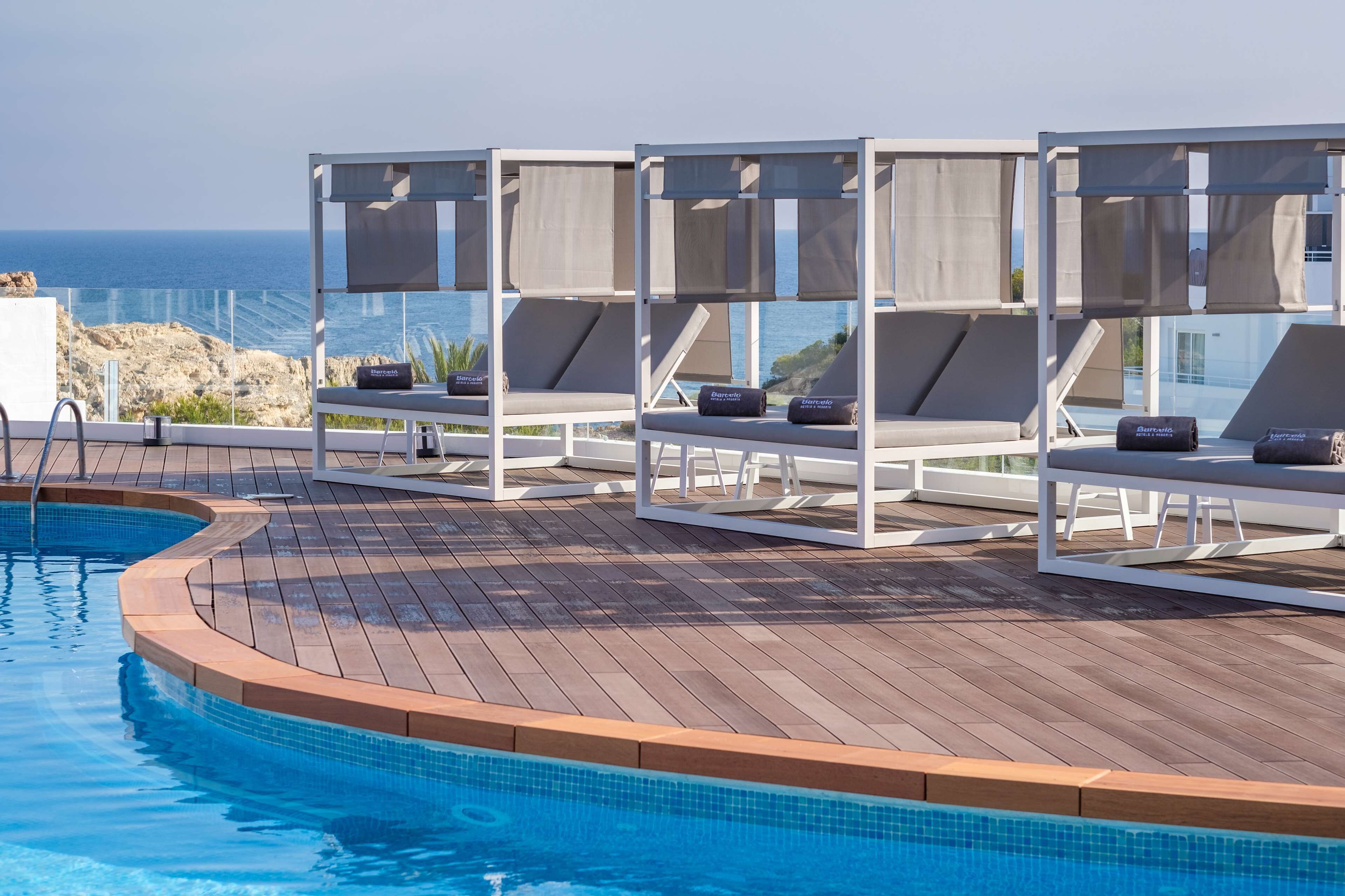 2 outdoor pools, pool umbrellas, sun loungers