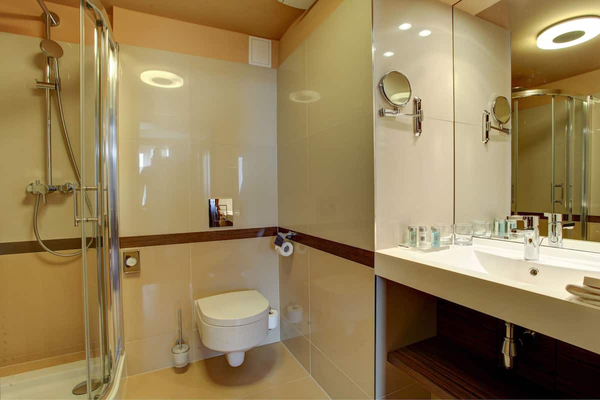 shower, designer toiletries, hair dryer, bathrobes