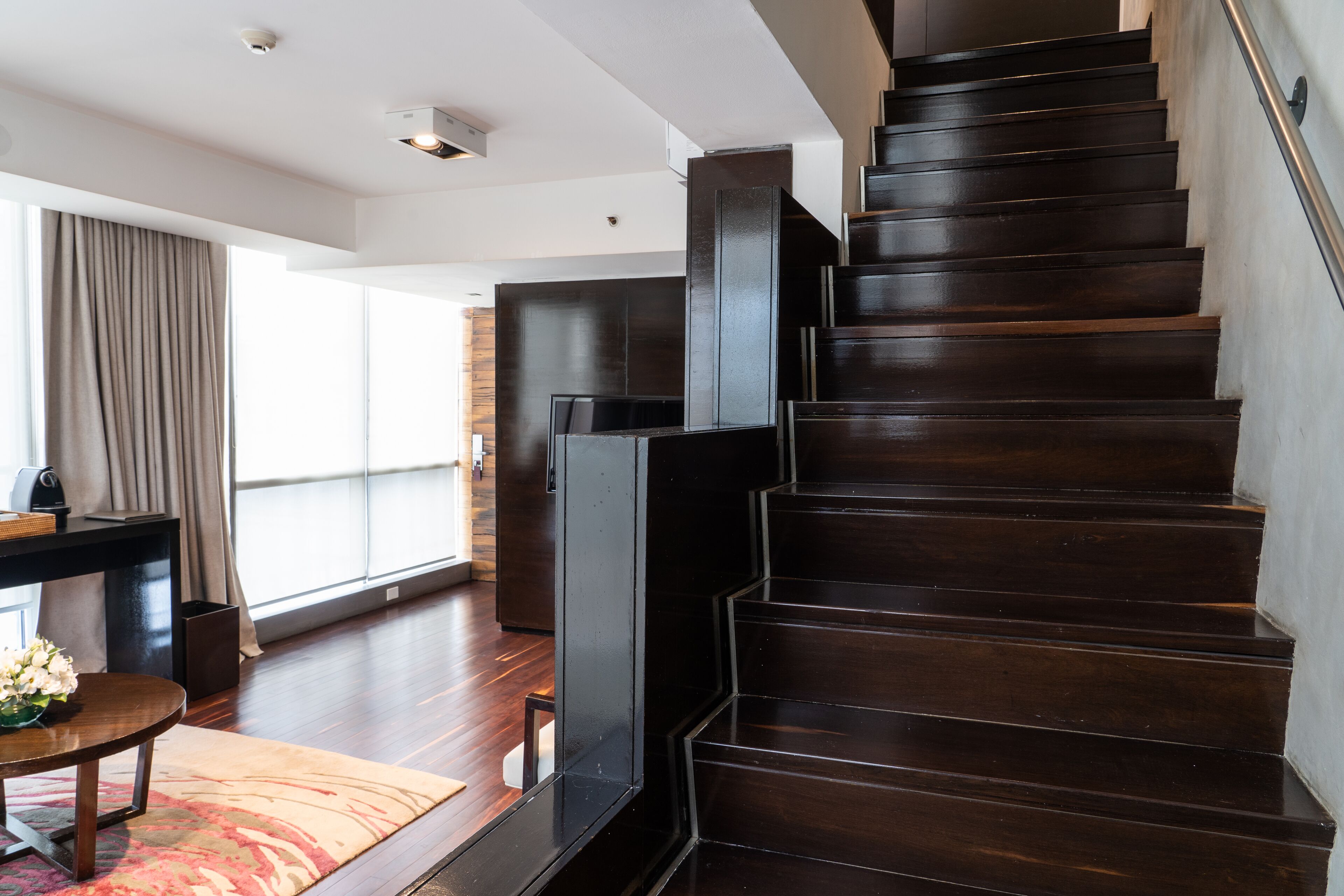 duplex | living area | 32-inch lcd tv with cable channels, tv, ipod dock