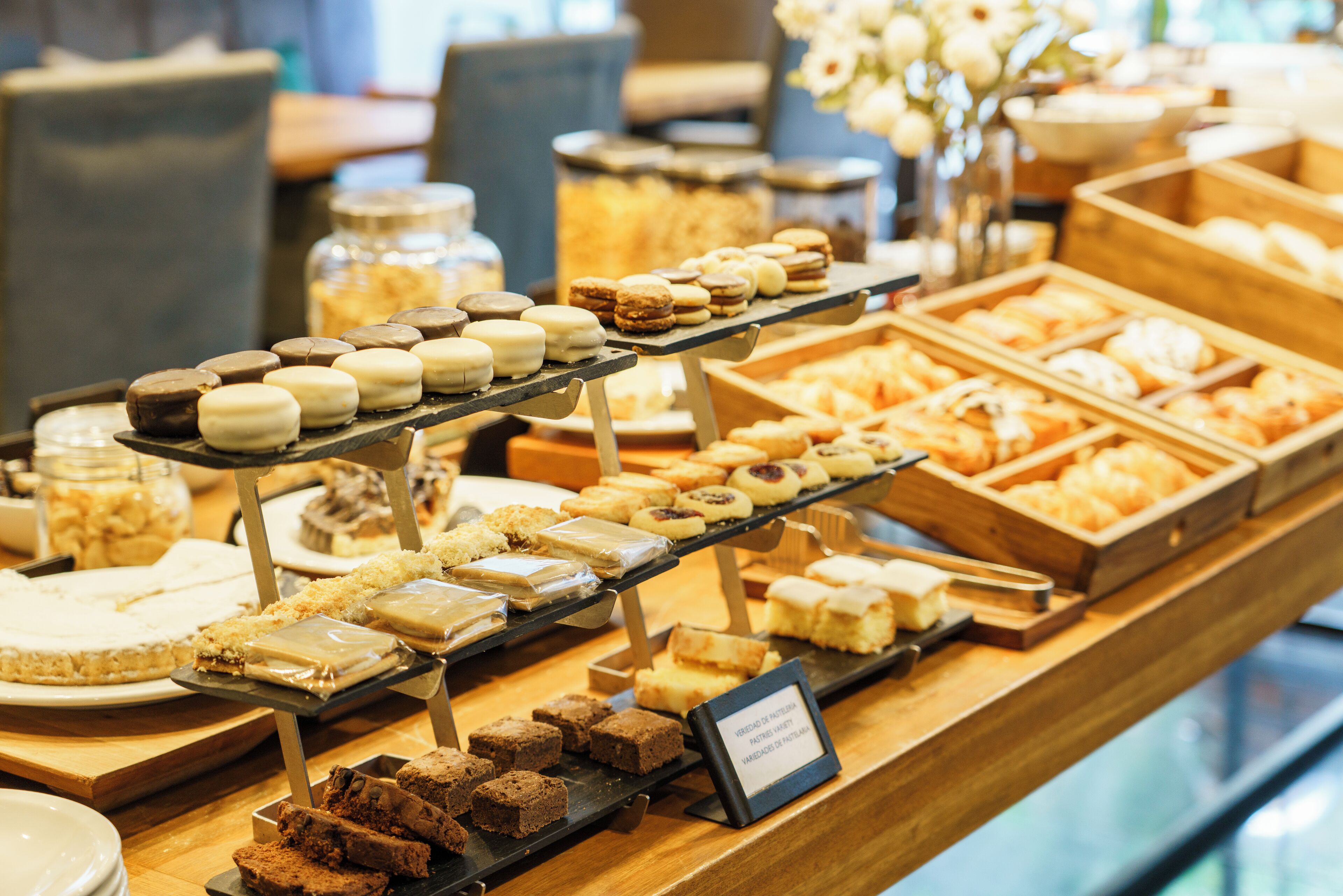 A buffet with various desserts and pastries.