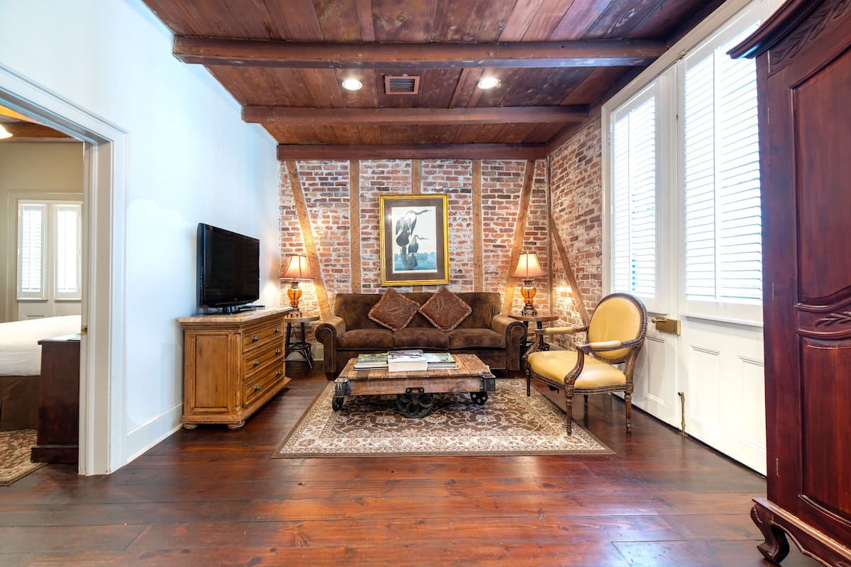 Audubon Cottage 1 | Living area | 42-inch flat-screen TV with cable channels, TV, iPod dock