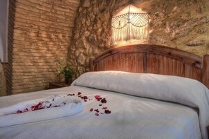 Minibar, desk, bed sheets