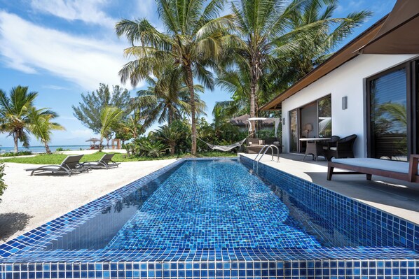Luxury Ocean Front Pool Villa | 1 bedroom, minibar, in-room safe, desk