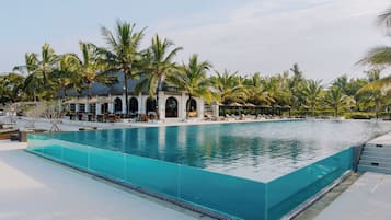 Outdoor pool, pool umbrellas, pool loungers