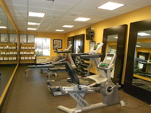 Stay active in our well-equipped fitness center with treadmills and weight machines.