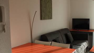 Comfort Apartment, 1 Bedroom, Kitchenette | 1 bedroom, desk, soundproofing, iron/ironing board