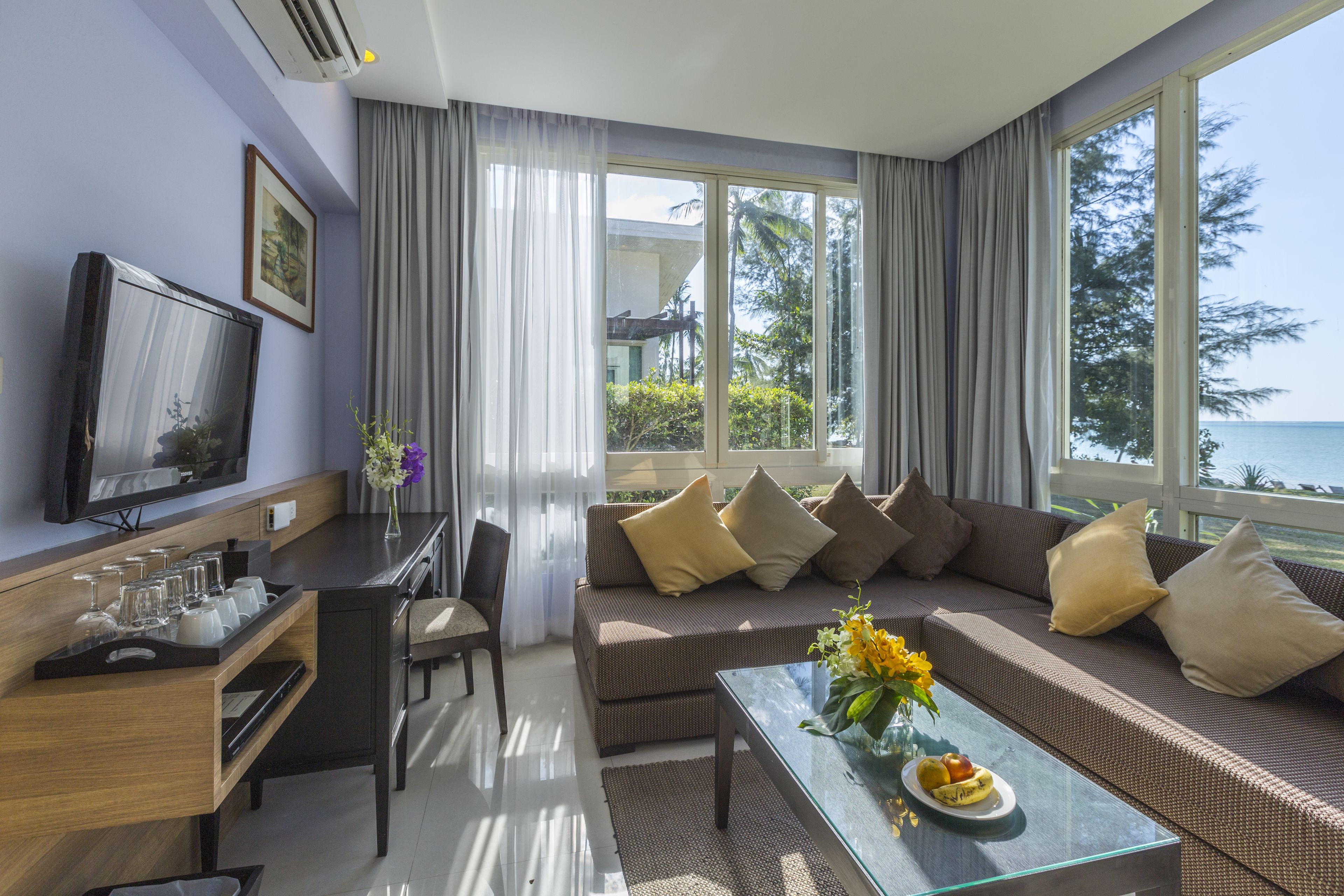 villa | living area | 32-inch lcd tv with satellite channels, tv, dvd player