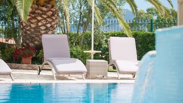 Seasonal outdoor pool, pool umbrellas, sun loungers