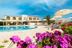 Seasonal outdoor pool, pool umbrellas, sun loungers