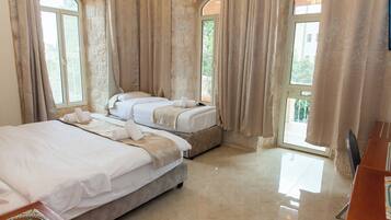 Family Room, Balcony | Minibar, in-room safe, free WiFi