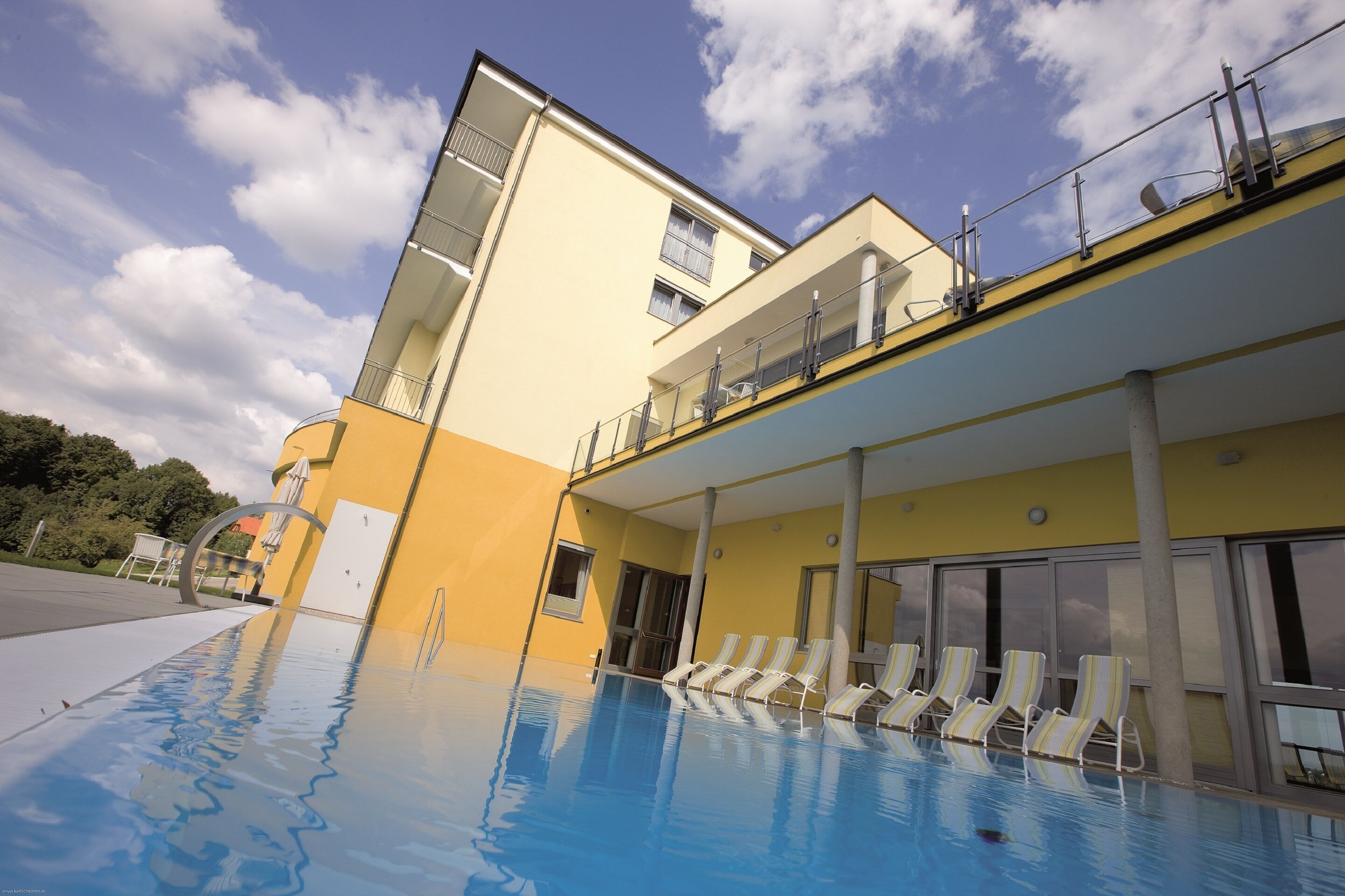 seasonal outdoor pool, pool umbrellas, pool loungers