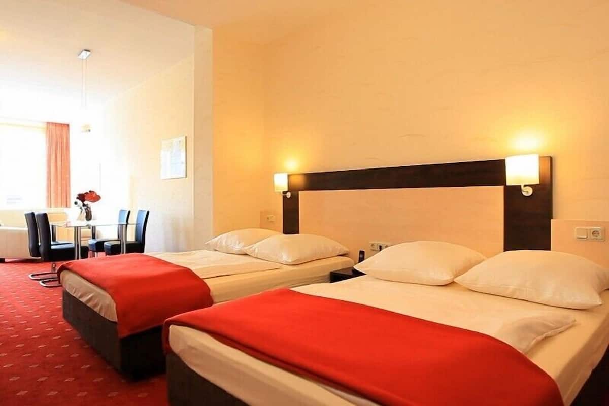 desk, blackout curtains, soundproofing, free wifi