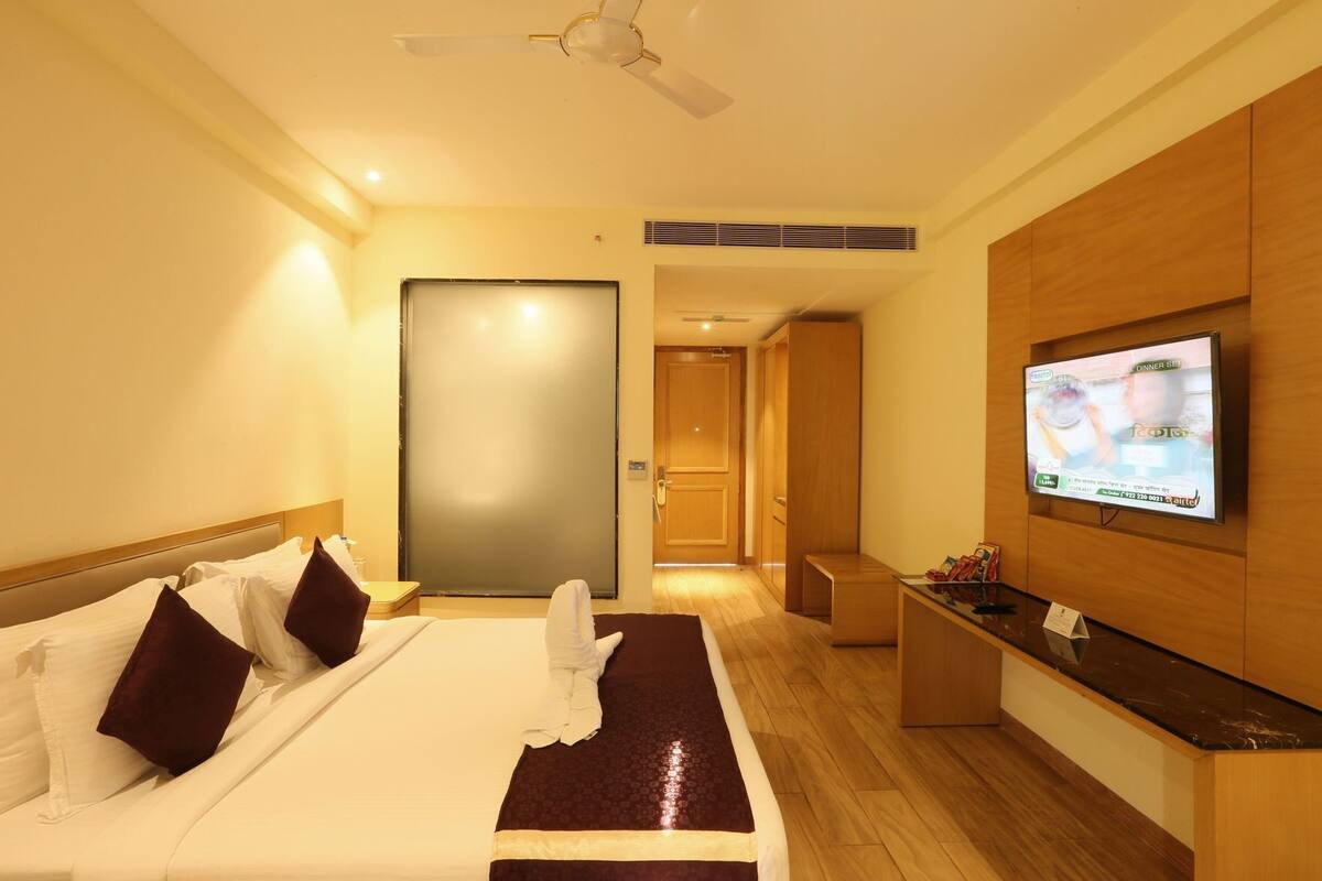 Premium bedding, memory-foam beds, minibar, in-room safe