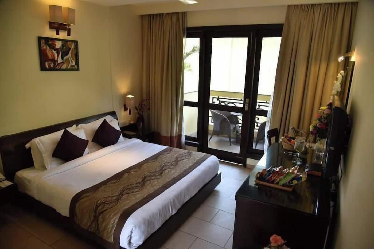 Premium bedding, memory-foam beds, minibar, in-room safe