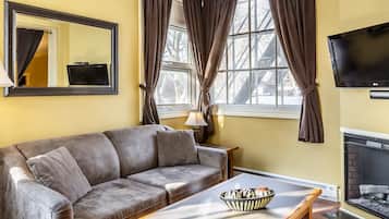 Economy Plus Room | 1 bedroom, desk, blackout drapes, iron/ironing board