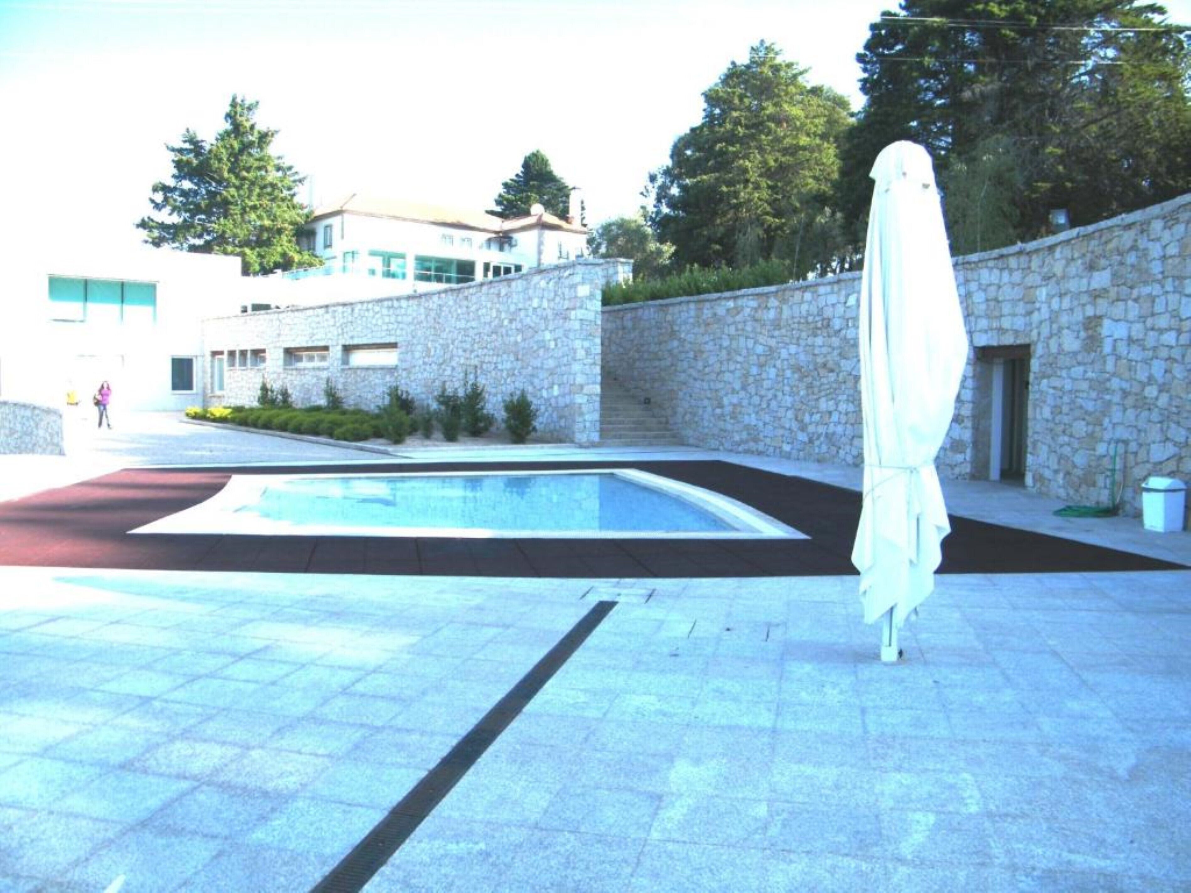 2 outdoor pools, pool umbrellas, pool loungers