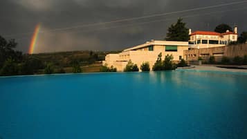 2 outdoor pools, pool umbrellas, pool loungers