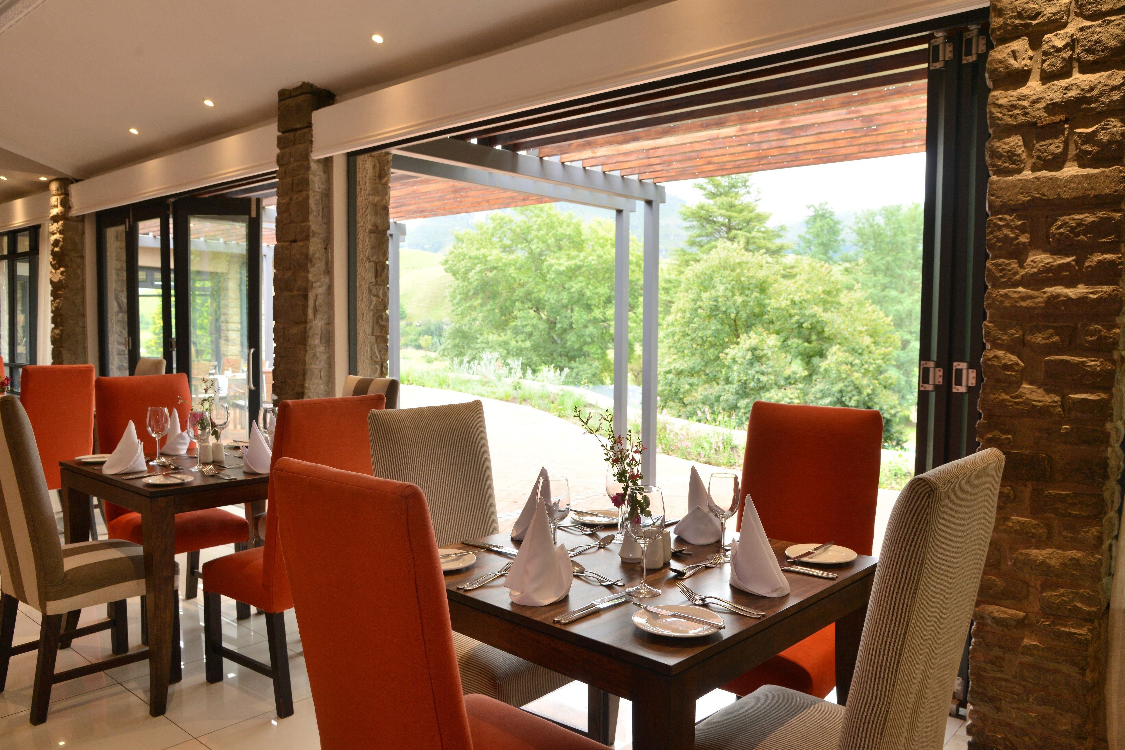 Breakfast, dinner served; local cuisine, pool views 