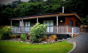 Front of property - evening/night - Tangiaro Kiwi Retreat (Port Charles)