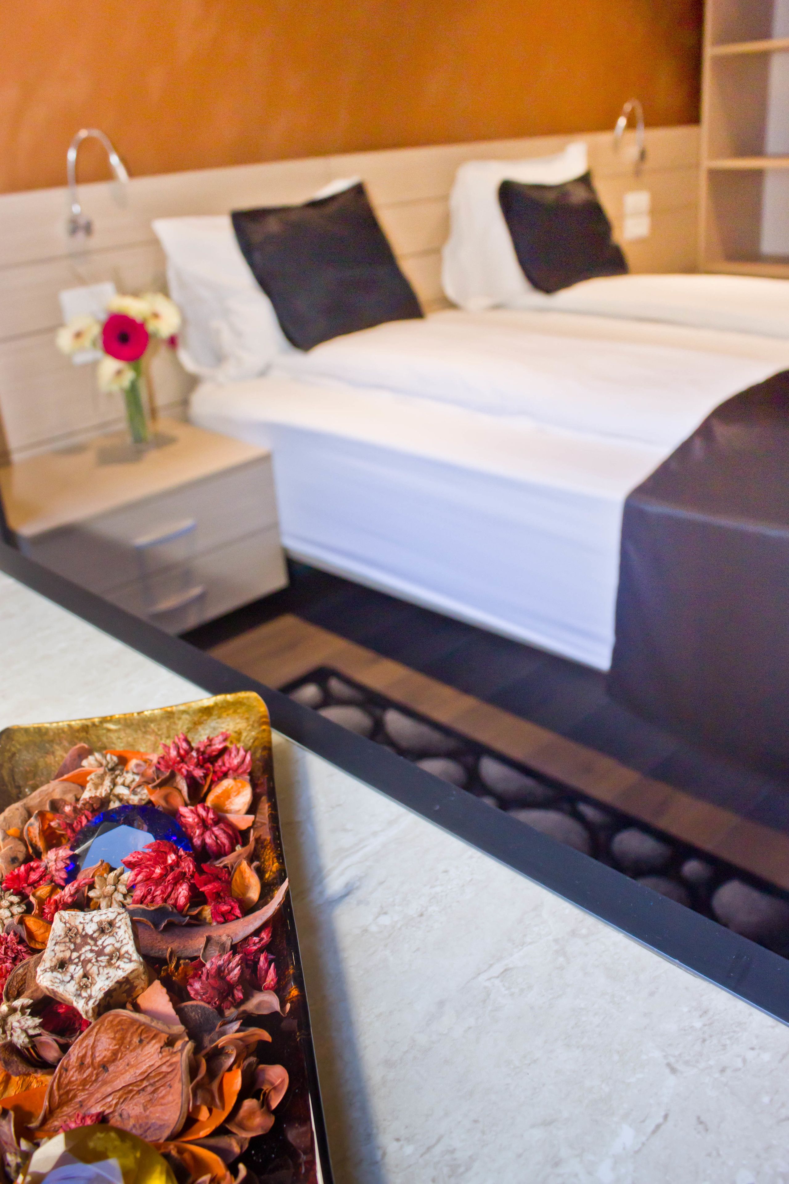 Frette Italian sheets, premium bedding, memory foam beds, minibar