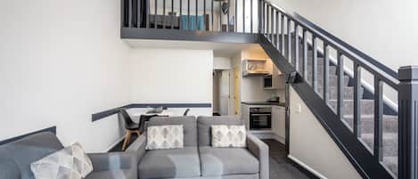 Suite, 2 Bedrooms | Living area | LCD TV, DVD player